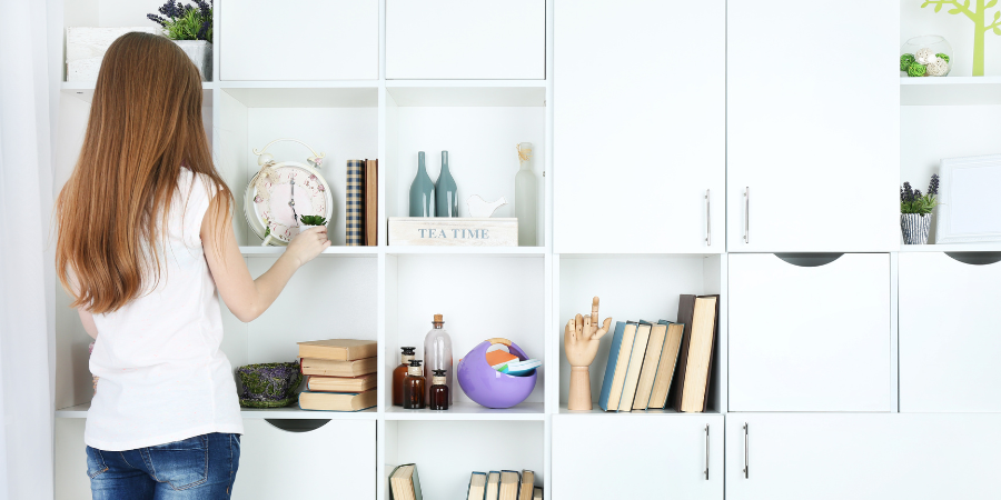 Woman organizing shelves